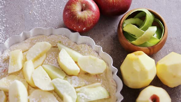 Slice of apple on tart with icing sugar 4k