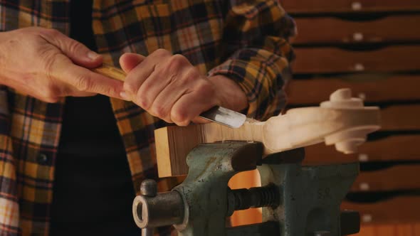 Female luthier at work in her workshop