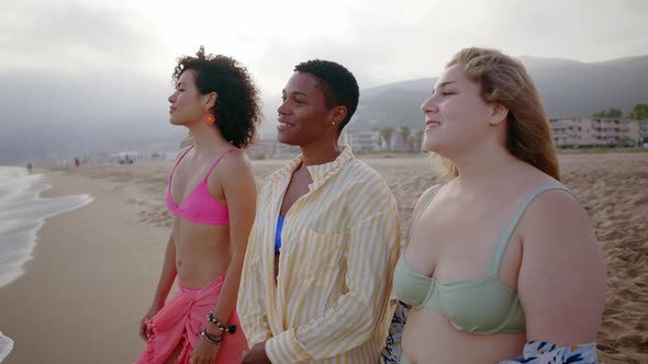 young women having fun on the beach