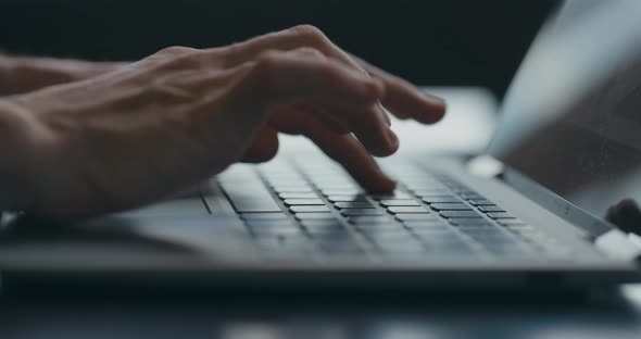 Male Hands Close Up Typing Text on Laptop