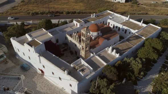 Aerial view of Agios Nikolaos church in Spetses next to a road, Greece.