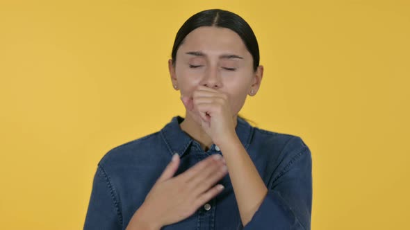 Sick Latin Woman Coughing, Yellow Background 