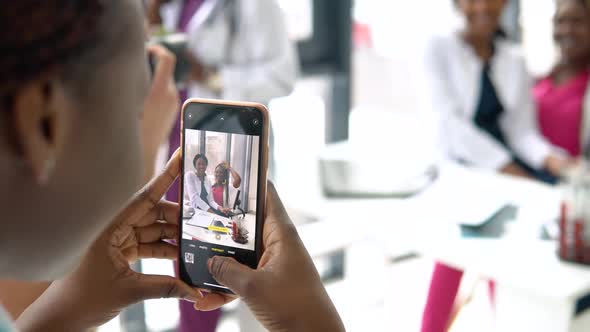 Female Students are Photographed on the Phone