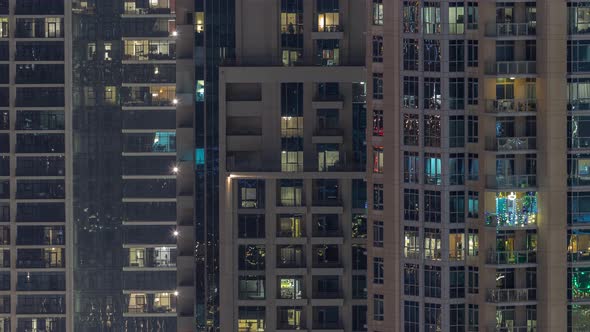 Big Glowing Windows in Modern Residential Buildings Timelapse at Night