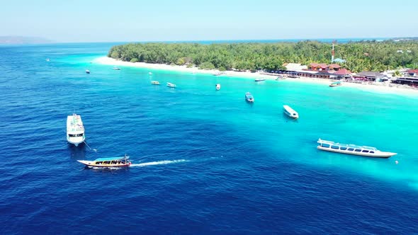 Aerial landscape of beautiful lagoon beach vacation by turquoise lagoon and white sandy background o