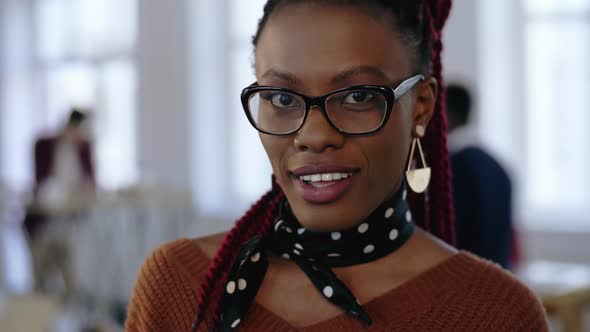 Close-up Portrait of Young Smart African Business Woman in Eyeglasses with Serious Look, Then