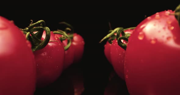 Wet red coktail tomatoes super macro close up 4k