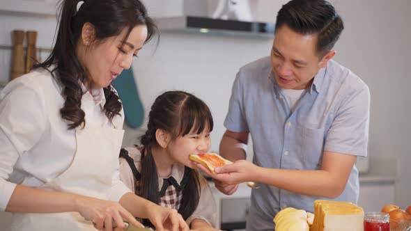 Family relationship, Asian happy family making food preparation in kitchen room at house