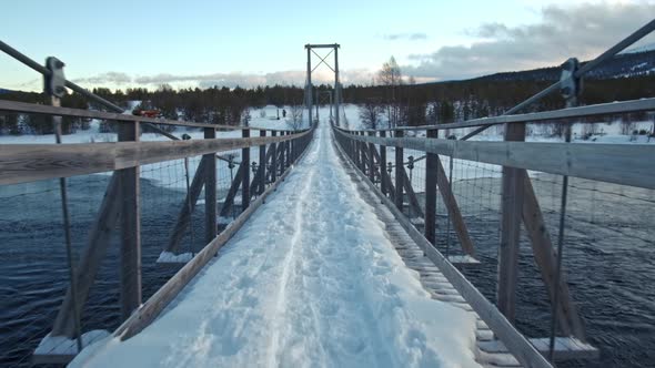 Frozen Wooden Bridge River. Norwey