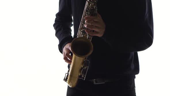 Blues on the Saxophone, Musician Playing Solo in White Studio
