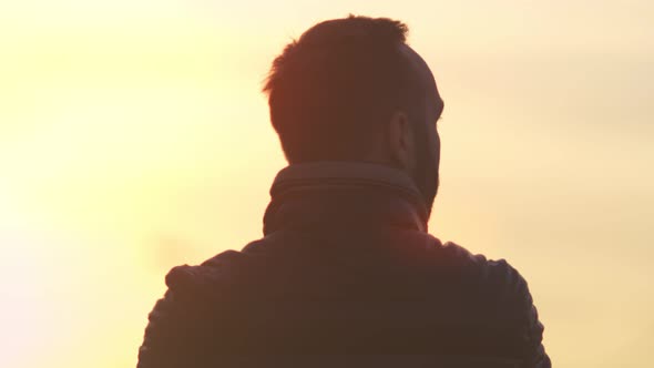 Portrait Back View Active Male Tourist Wearing Jacket Admiring Amazing Yellow Sunset