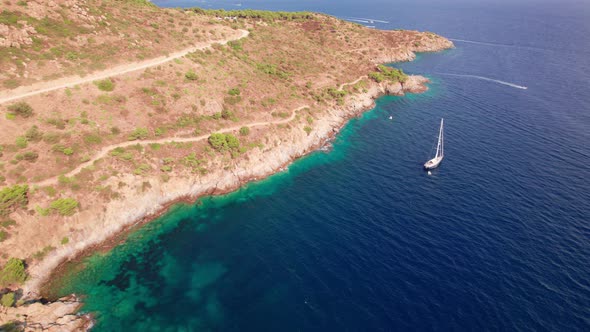 Drone Over Yacht Off Coastline Of Cap De Creus