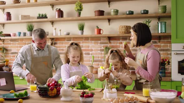 Beautiful Big Family at the Kitchen Island