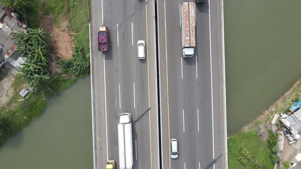 Top Aerial view of Indonesia Highway with busy traffic.