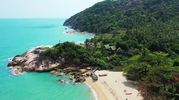 Aerial above sky of luxury island beach holiday by blue sea with white sandy background of a dayout 