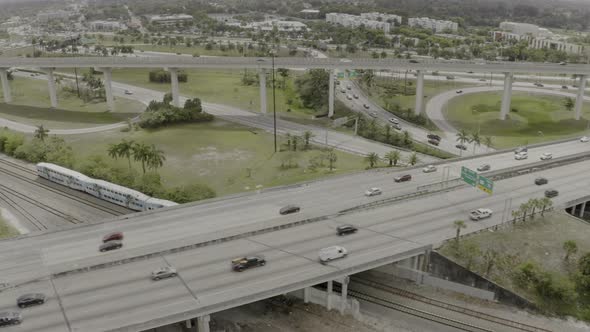 Aerial Video Miami Tri Rail Train By The Golden Glades Highway Interchange