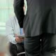 Woman on cellphone and businessmen talking - VideoHive Item for Sale