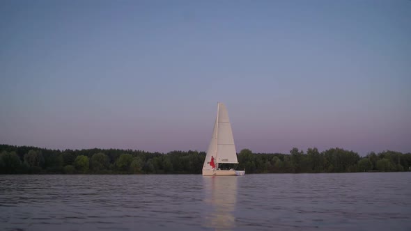 Girl in a Red Dress on a White Yacht. The Girl in the Crane Dress at Sunset Is Not a Yacht. Girl in