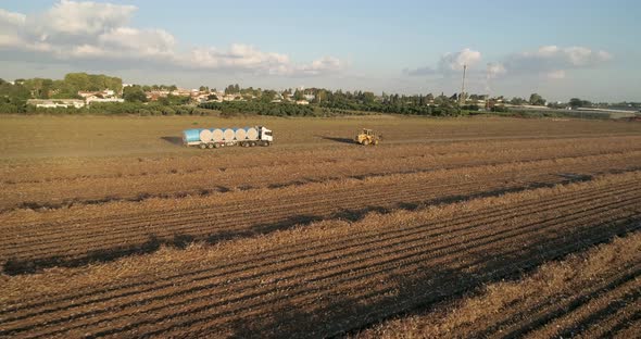 Aerial view of lorries in a cotton field, Israel.
