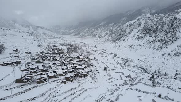 Aerial view of snow covering the village of Manang in the mountains of Nepal