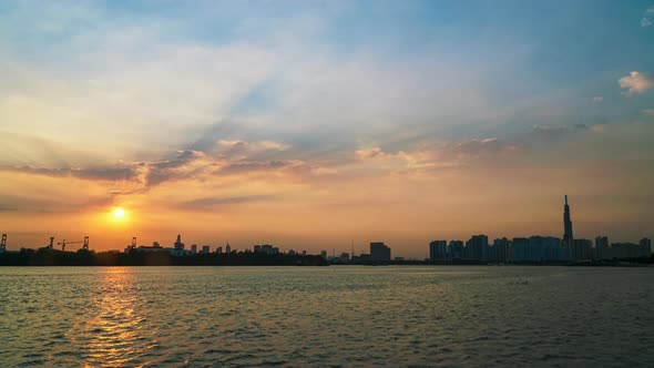 4K Time Lapse Of Sunset in Ho Chi Minh City - Sai Gon Day to Night, View From Riverside