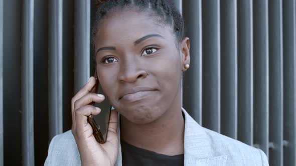 Confident Young Female Professional Standing Outside