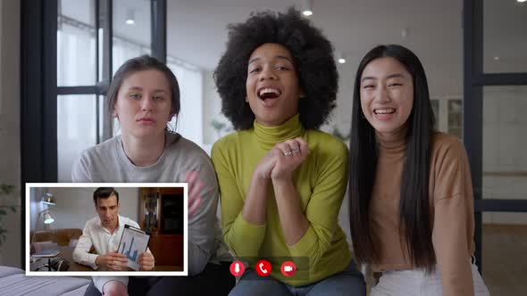 Positive Multiethnic Women Greeting Middle Eastern Man in Video Chat