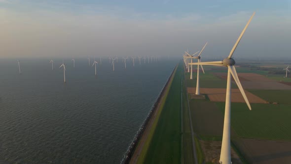 Windmills for Electric Power Production Netherlands Flevoland Wind Turbines Farm in Sea Windmill