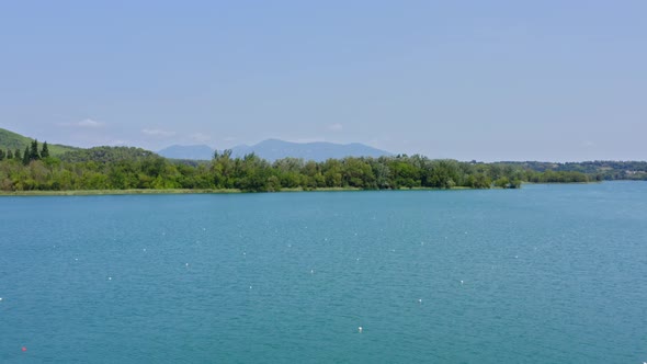 Flying across Lake Banyoles and the dramatic Spanish countryside in Catalonia.