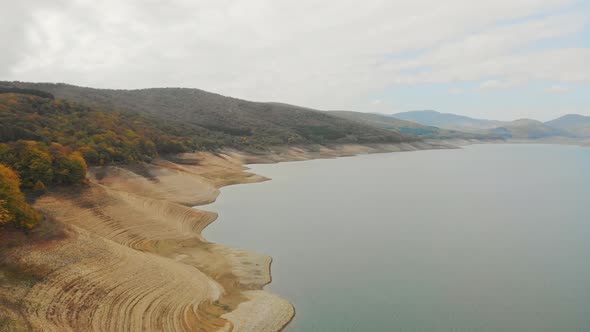 Tilt Down Aerial View Of Sioni Dam In Georgia.Log