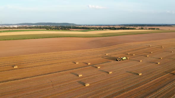 Aerial View of the Field with Hay Bales or Straw Bales After Harvest