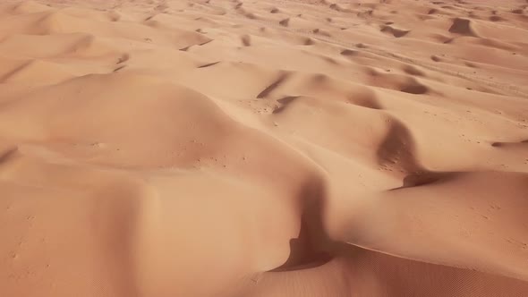 4K Aerial view dunes in the desert of Abu dhabi. United Arab Emirates in the winter