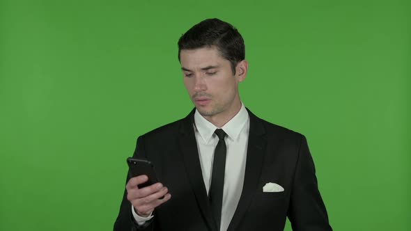 Handsome Businessman Using Cellphone Chroma Key