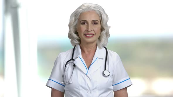 Portrait of Happy Female Doctor.