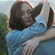 Slow Motion of a Young Woman Gently Hugs Her Boyfriend at Sunset. - VideoHive Item for Sale