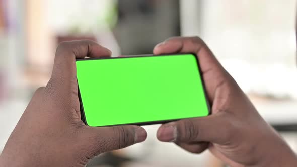 Horizontal Chroma Key Smartphone, African Hands