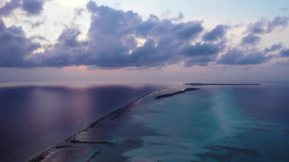 Aerial drone abstract of paradise coastline beach voyage by blue green ocean with bright sand backgr