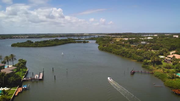 Boats traveling down waterway, Indian River, Florida