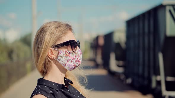 Woman In Mask Protection Epidemic Coronavirus On Public Transport Station. Girl Waiting Train.