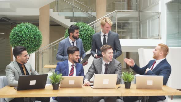 Group of Diverse Young Business Executives Holding a Meeting in Office