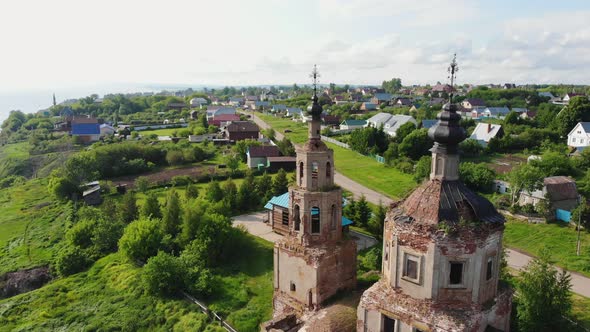 Dilapidated Christian Church in the Village of Country Houses