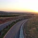 Aerial view of highway at sunset or sunrise. Cinematic view at sunset. - VideoHive Item for Sale