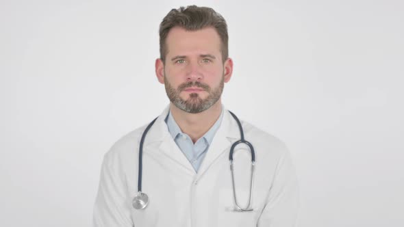 Portrait of Middle Aged Doctor Looking at the Camera