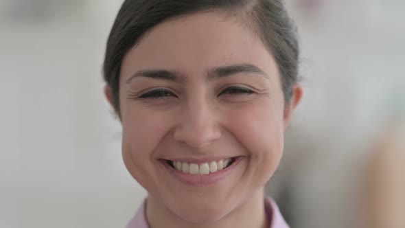 Close up of Indian Woman Smiling at the Camera