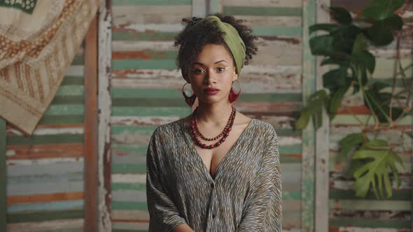 Young Stylish African American Woman Wearing Ethno Style Smiling to Camera Rustic Background