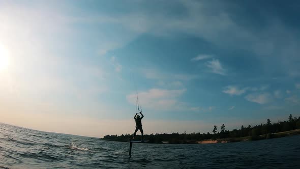 A Man Is Falling From the Board While Kitesurfing