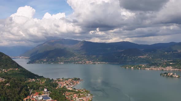 Panning panoramic view over Orta lake and San Giulio island, Italy