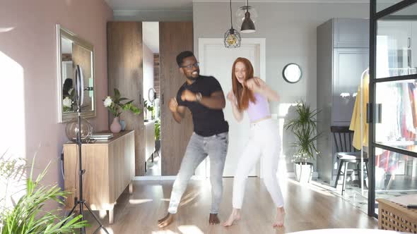 Romantic Funny Couple Dancing at Home