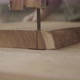 close up of a block of wood being sawed - VideoHive Item for Sale