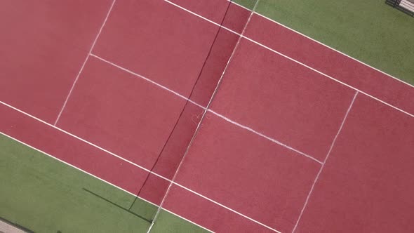 The goal of tennis is to hit the ball over the net into the other player's court.When the other play